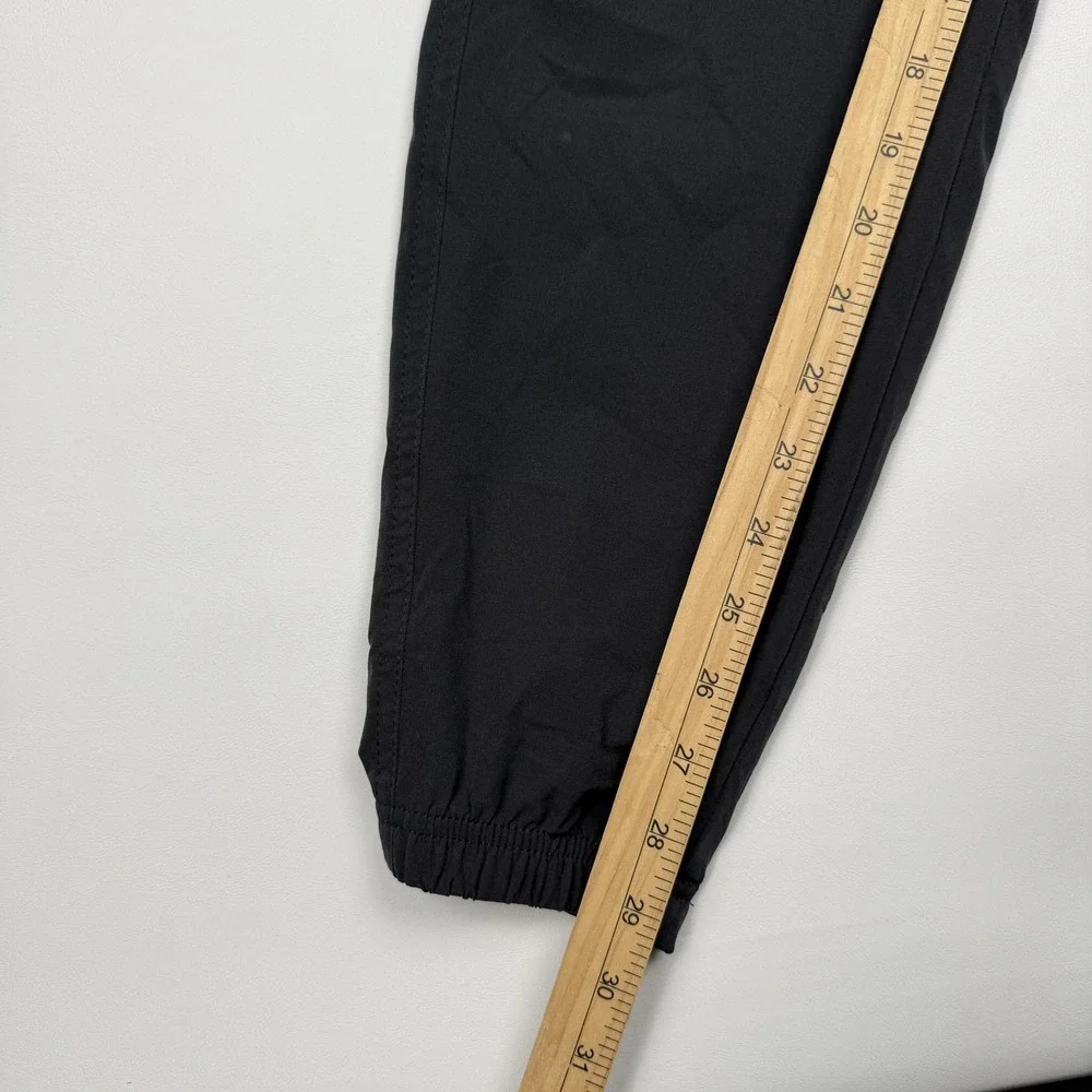 Kuhl Freeflex Jogger Pants Mens Small Black Woven Stretch Zip Pocket Athletic